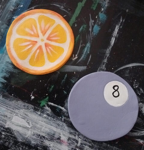 round orange and purple costers.
